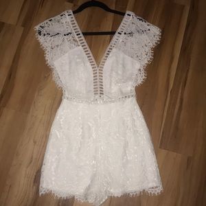 Stunning white lace cut out romper